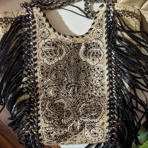 Kippy's fringe handbag